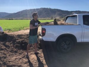 FPGS Patron loading Monkey Hair Mulch | SPVS