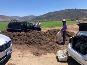 Happy FPGS Participants with Monkey Hair Mulch | SPVSoils