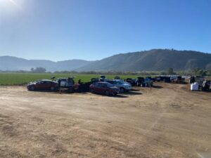Cars parked ready for loading Valley's Best Compost® at FPGS event | SPV Soils