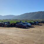 Close-up of cars parked ready for loading Valley’s Best Compost® at FPGS event | SPV Soils