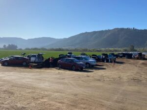 Close-up of cars parked ready for loading Valley's Best Compost® at FPGS event | SPV Soils