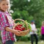 Girl Gardening With Family | SPV Soils