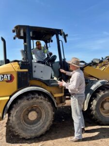Dr. K with Cesar on Tractor | SPV Soils